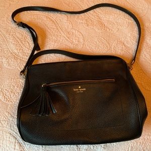 Kate Spade black tote style purse with handle and cross body strap.